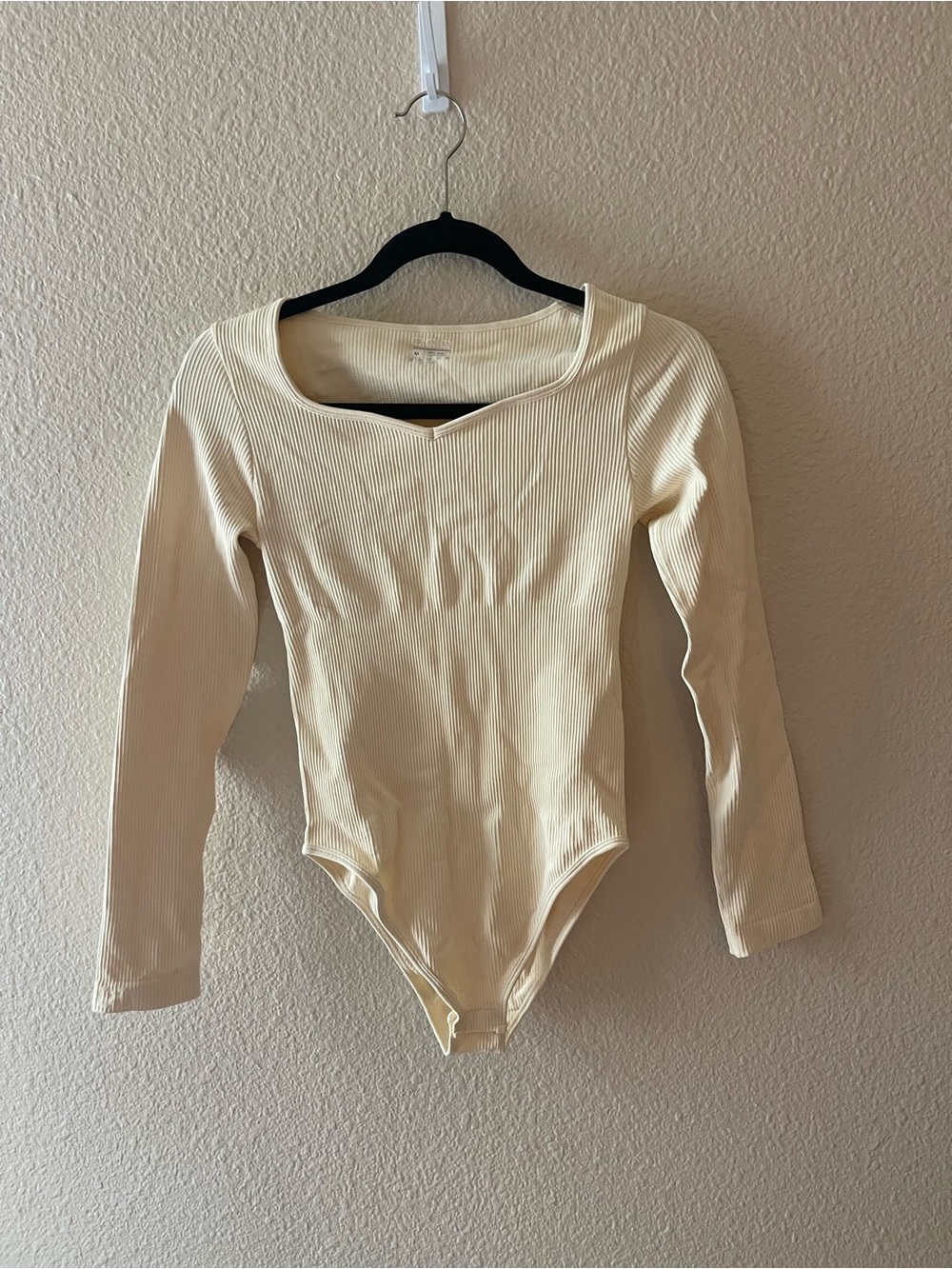OQQ Ribbed Long-Sleeve One-Piece Bodysuit
